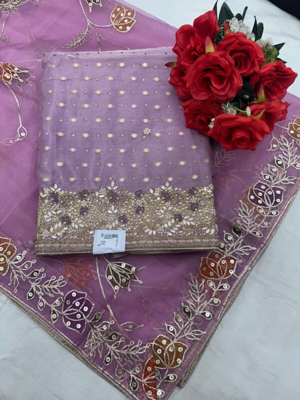 Beautifully embroidered organza fabric suit with embroidered sleeves with gotta patti embroidered dupatta
