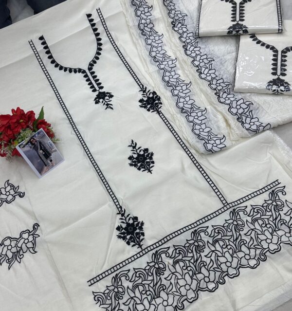 Beautifully embroidered pure muslin cotton suit with embroidered sleeves with embroidered organza dupatta