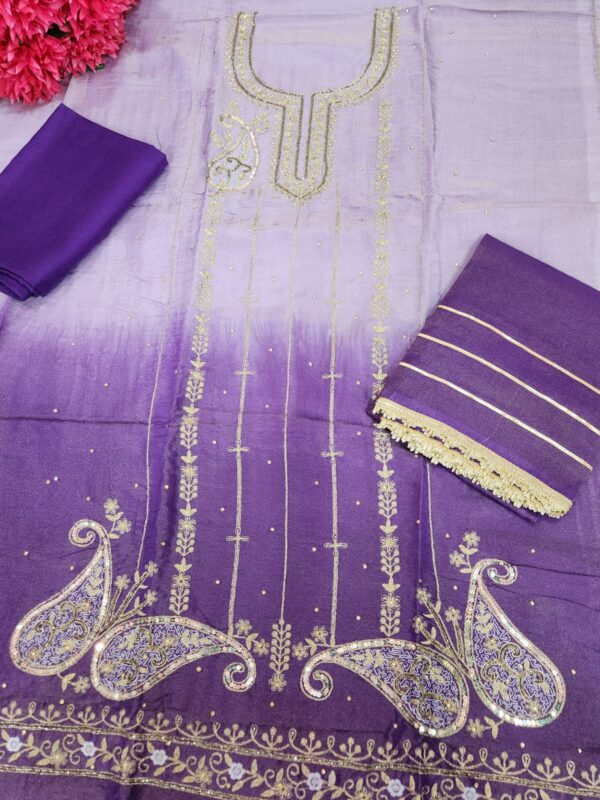 Beautifully full front embroided double shade Shimmer fabric suit with embroided sleeves