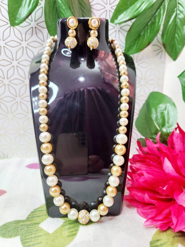 Cream and golden moti Mala with semi diamond  moti