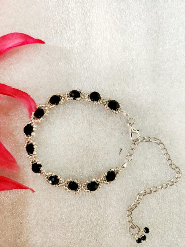 HFS Black And White crystal beads handcrafted bracelet. 